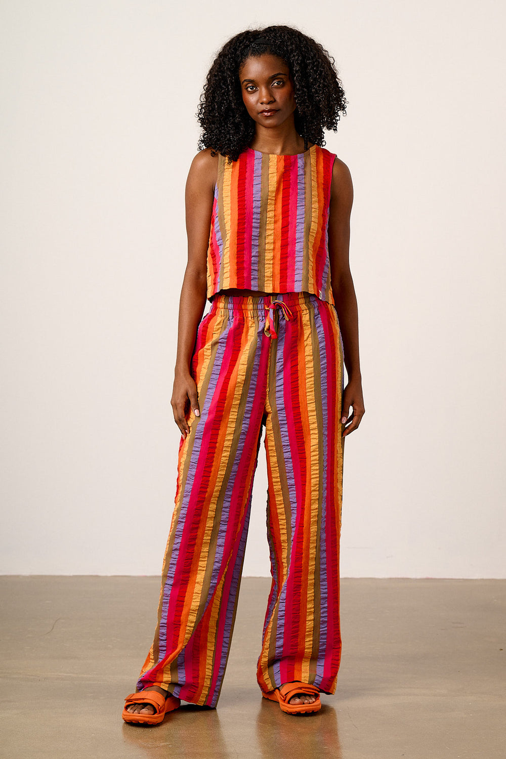 Norris - Wide Leg Trousers Organic Cotton Seersucker in Wide Rainbow Stripe