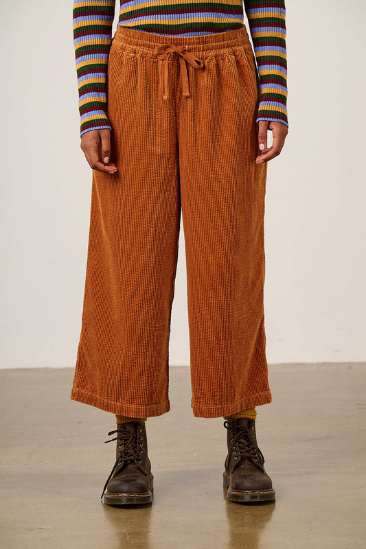 Chuck - Organic Corduroy Wide Leg Trousers in Rust