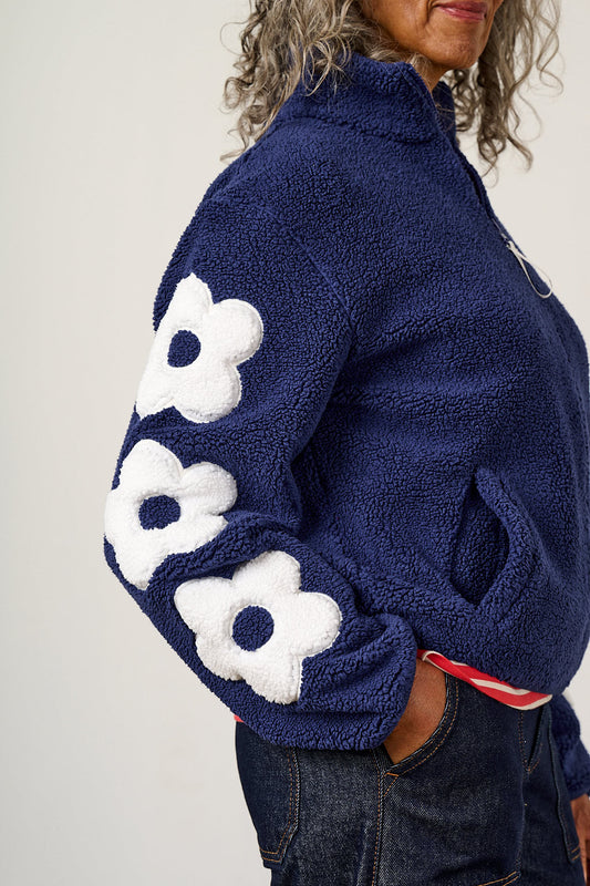 Margot - Borg Fleece Recycled Polyester in Navy and Ecru with Flower