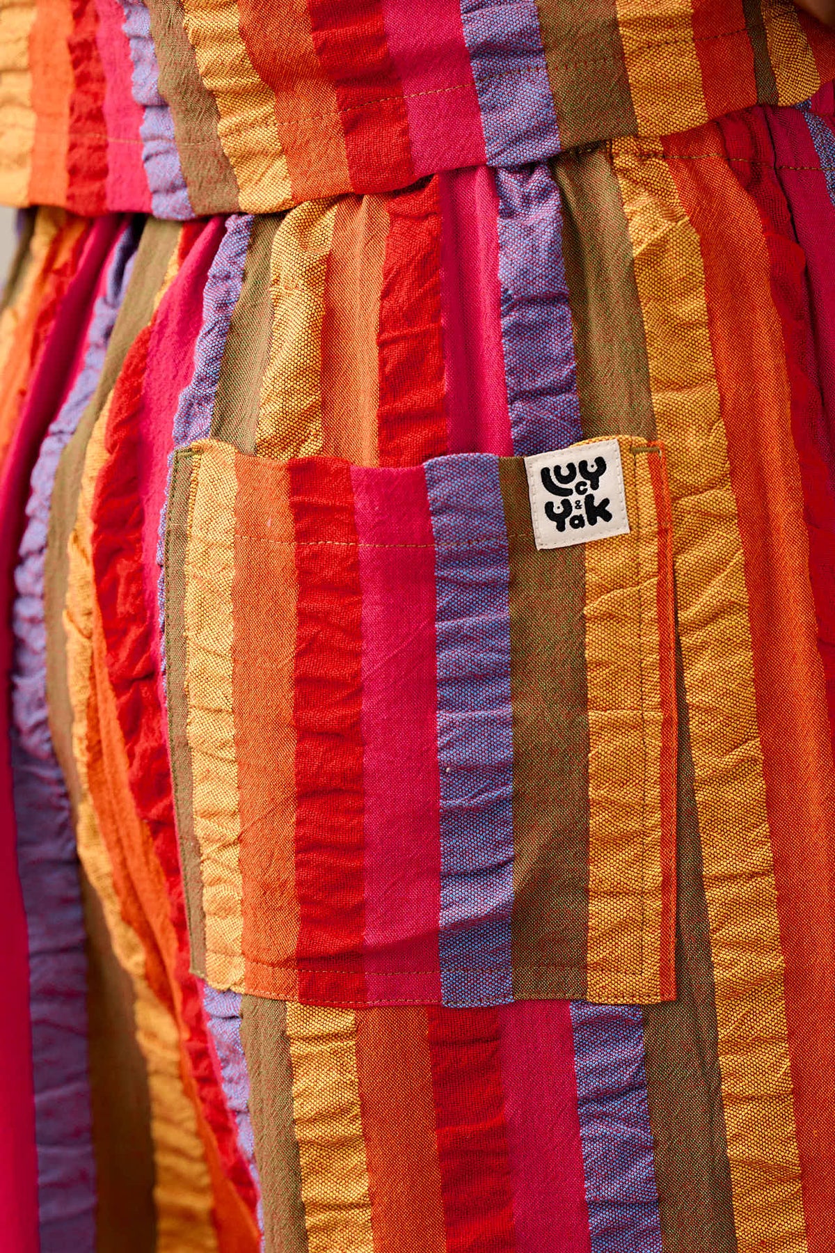 Norris - Wide Leg Trousers Organic Cotton Seersucker in Wide Rainbow Stripe