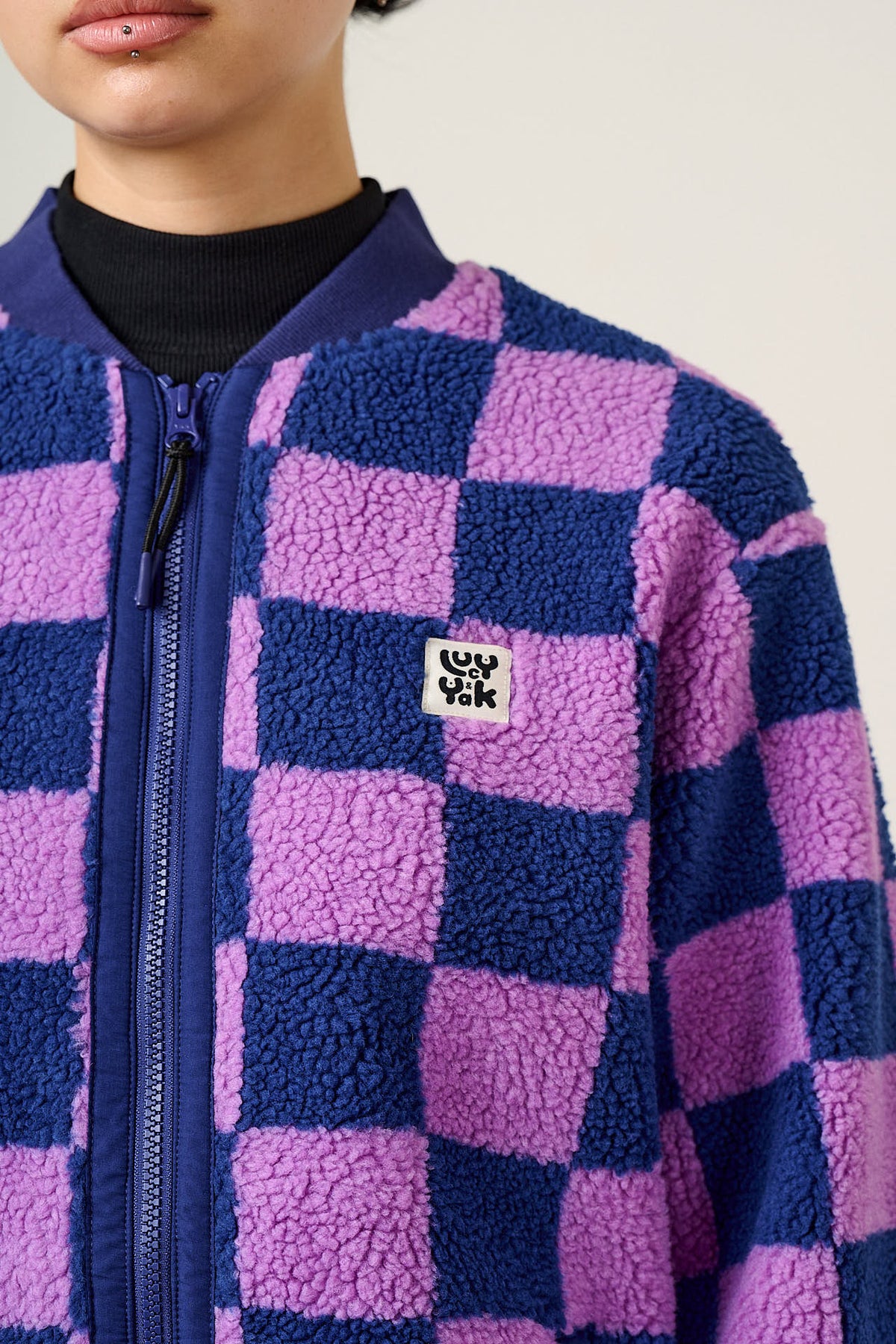 Cassie - Bomber Jacket Recycled Polyester Borg Fleece in Checkerboard