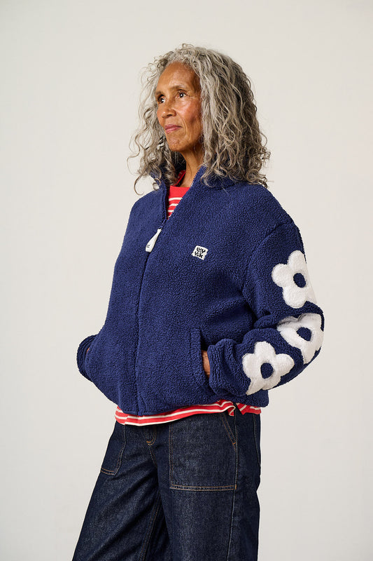 Margot - Borg Fleece Recycled Polyester in Navy and Ecru with Flower