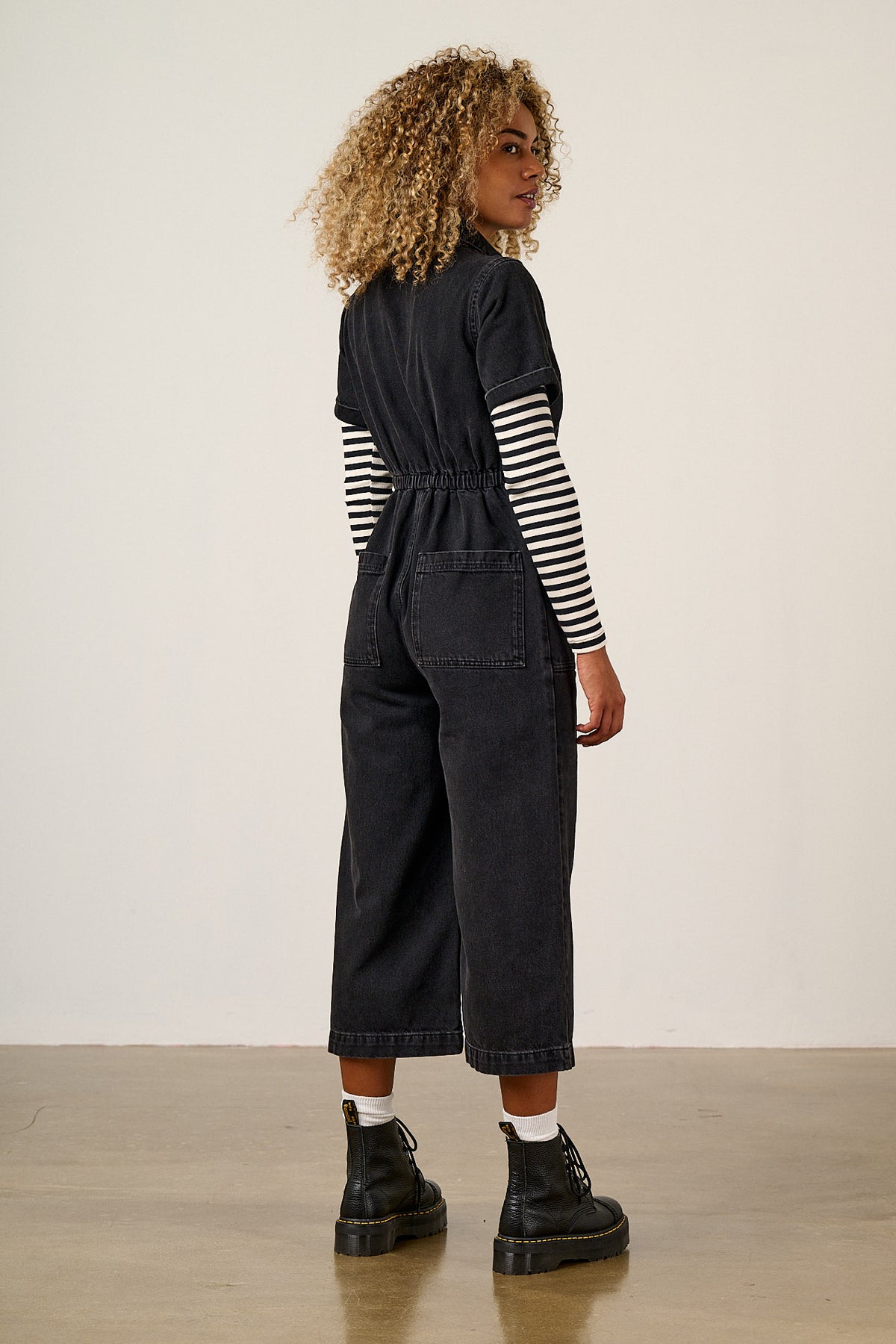 Ragan - Cropped Leg Jumpsuit Organic Cotton Denim in Washed Black with Punk Energy Patches