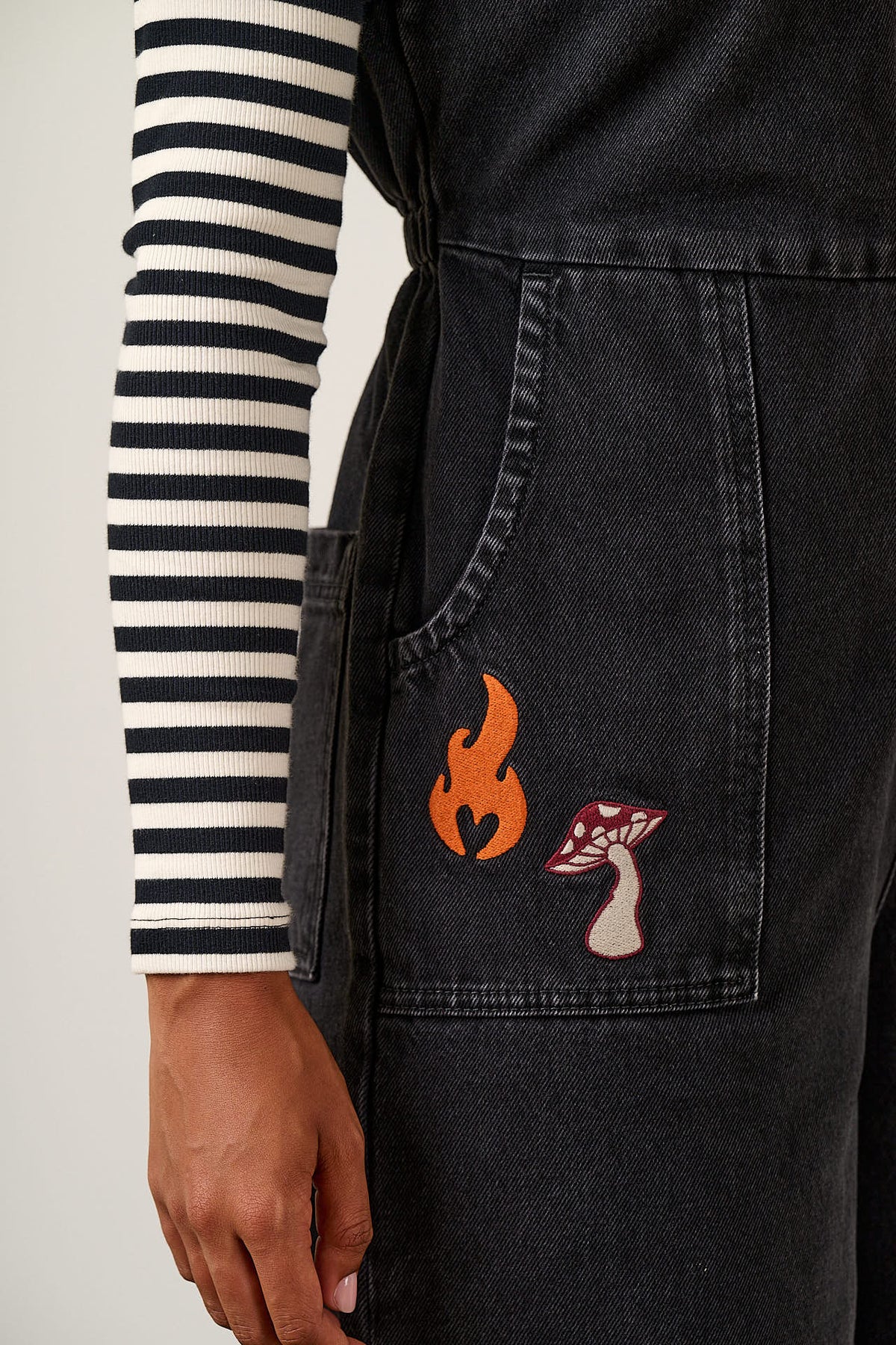 Ragan - Cropped Leg Jumpsuit Organic Cotton Denim in Washed Black with Punk Energy Patches