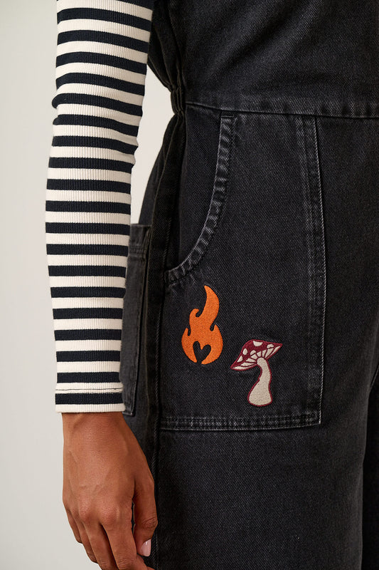 Ragan - Cropped Leg Jumpsuit Organic Cotton Denim in Washed Black with Punk Energy Patches