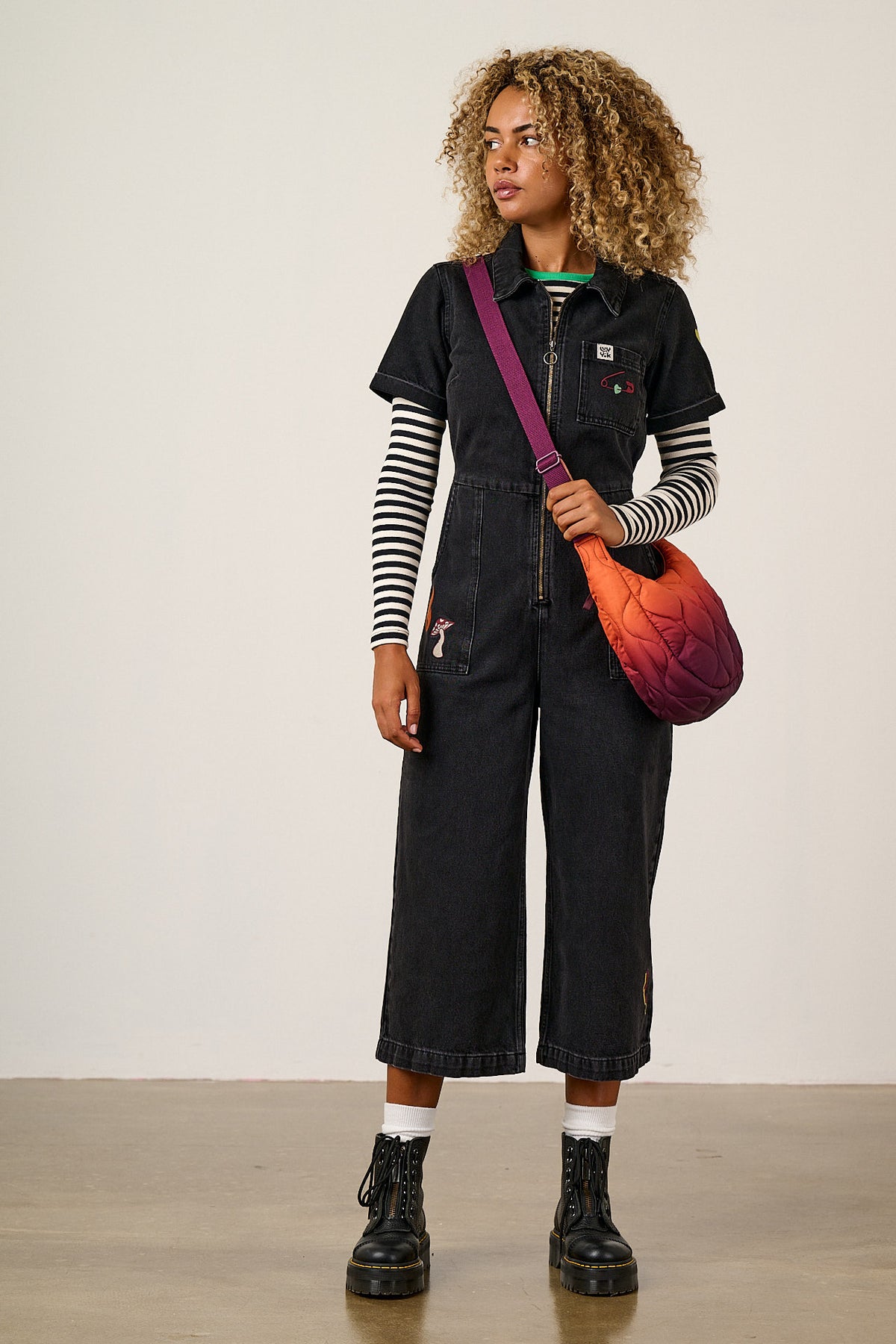 Ragan - Cropped Leg Jumpsuit Organic Cotton Denim in Washed Black with Punk Energy Patches