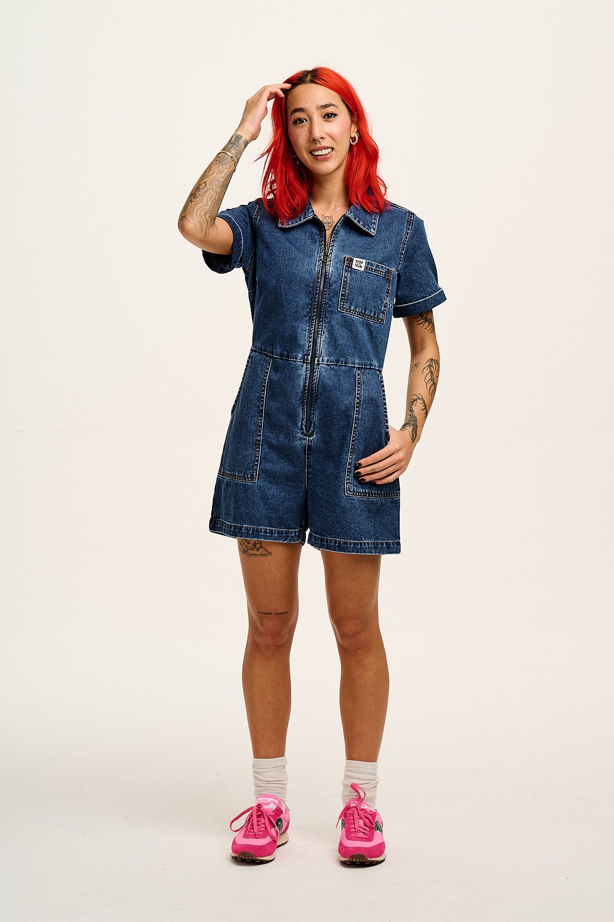 Riley - Short Sleeve Playsuit Organic Cotton Denim in Mid Wash Blue