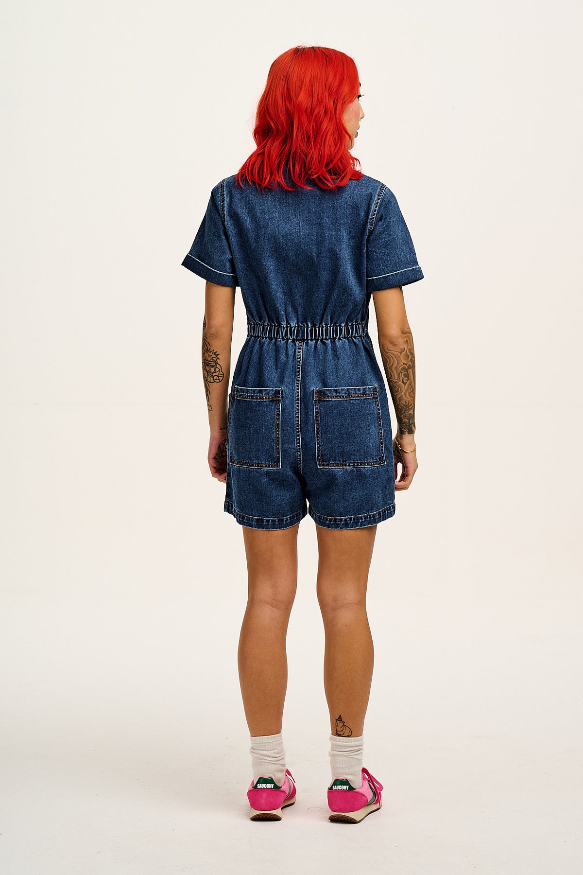 Riley - Short Sleeve Playsuit Organic Cotton Denim in Mid Wash Blue