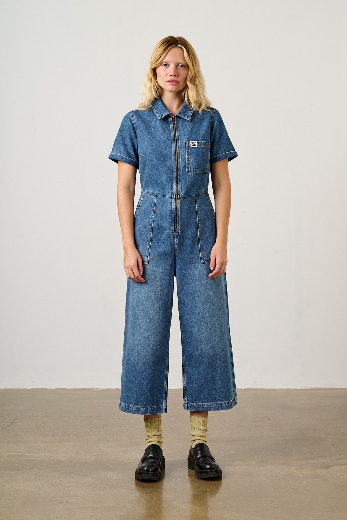 Ragan - Cropped Leg Jumpsuit Organic Cotton Denim in New Mid Wash Blue