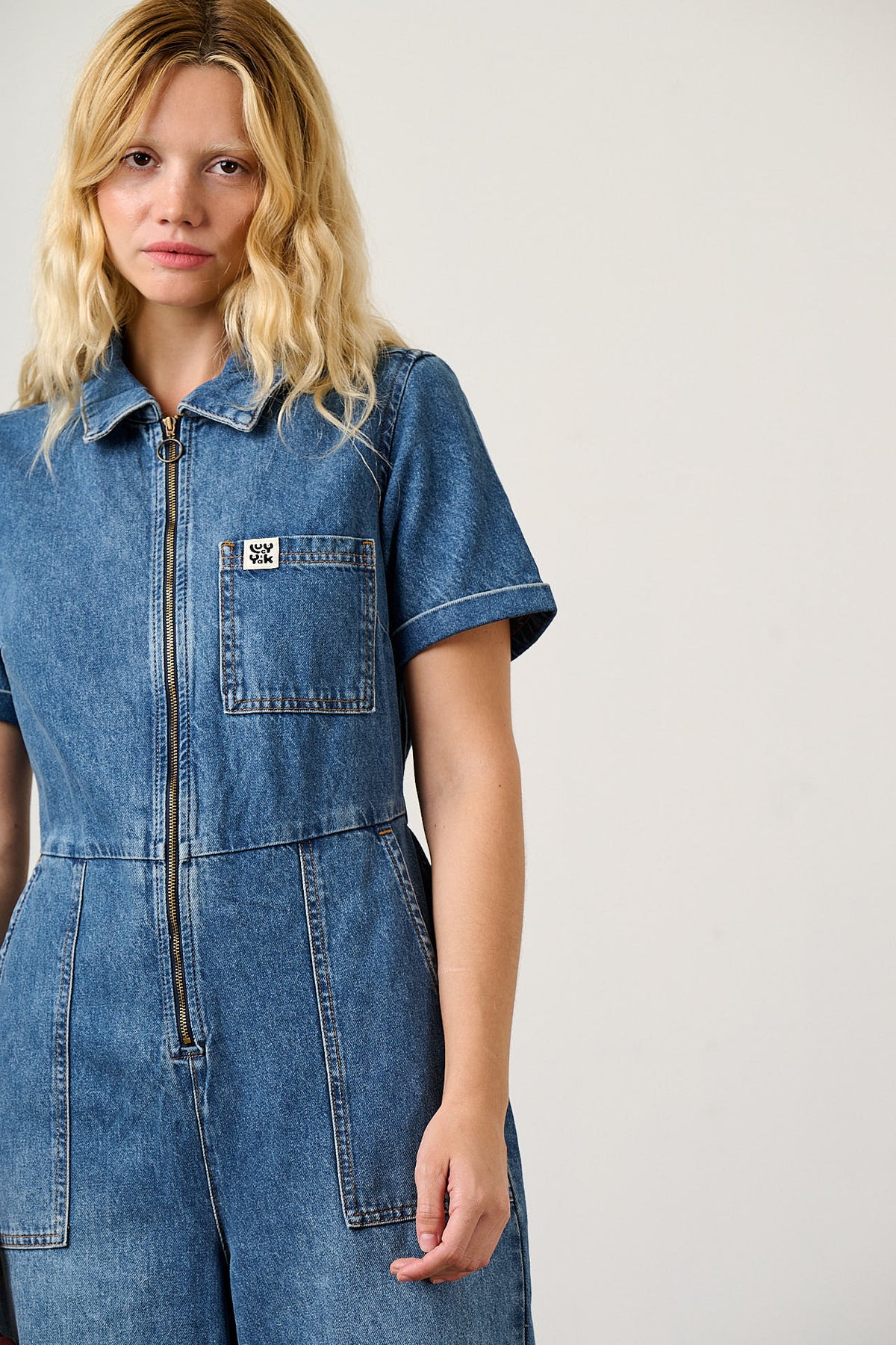 Ragan - Cropped Leg Jumpsuit Organic Cotton Denim in New Mid Wash Blue