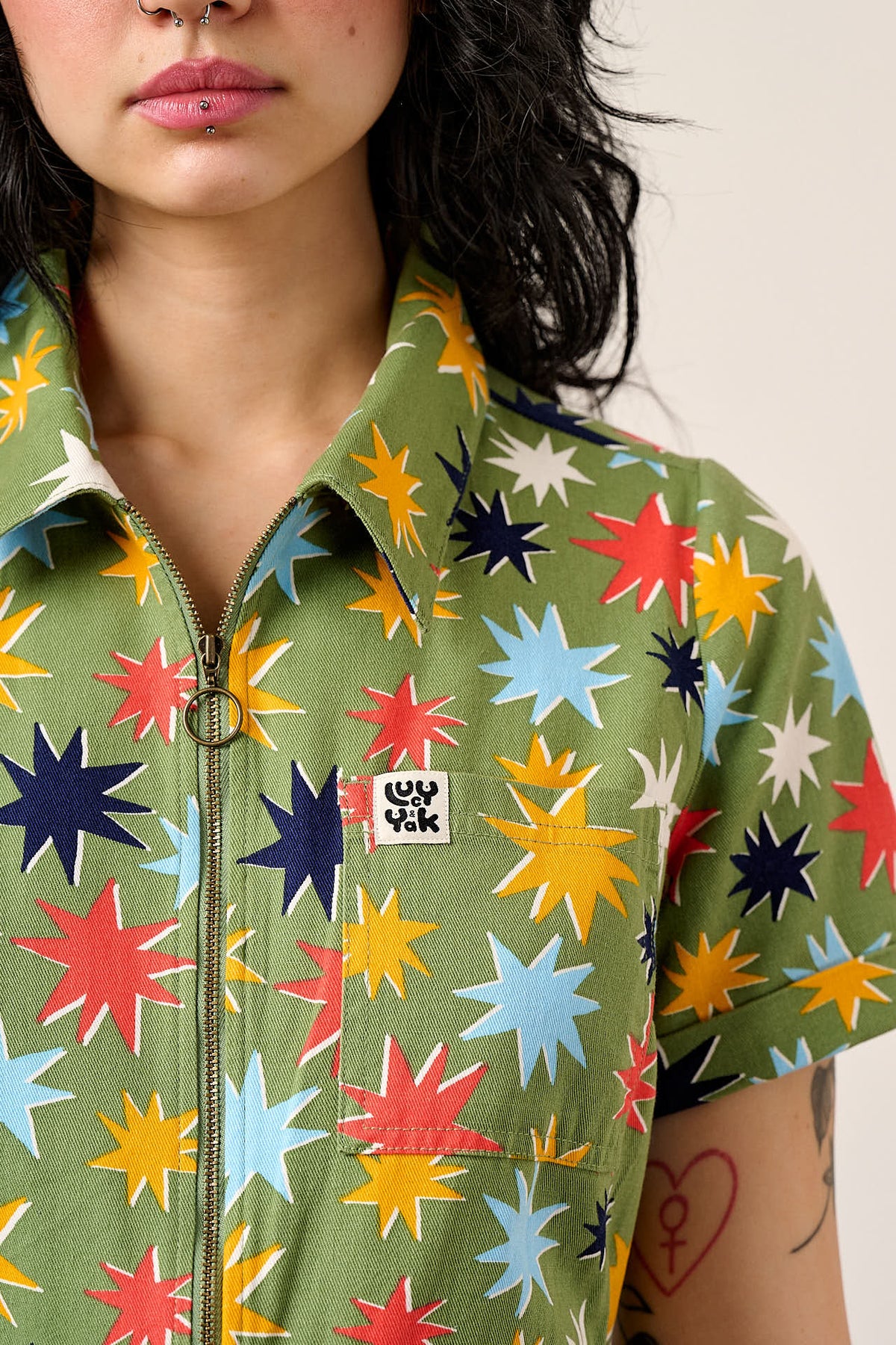 Riley - Short Sleeve Playsuit Organic Cotton Twill in Green Cosmic Folk Stars