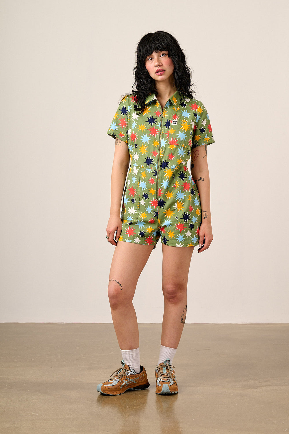 Riley - Short Sleeve Playsuit Organic Cotton Twill in Green Cosmic Folk Stars
