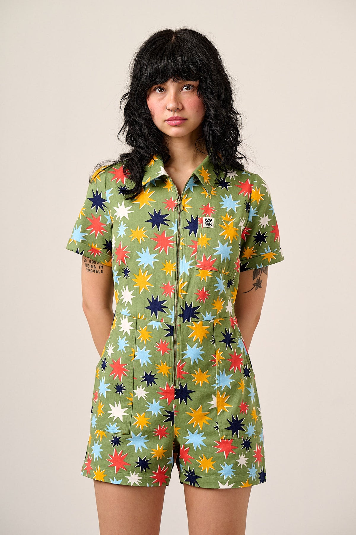 Riley - Short Sleeve Playsuit Organic Cotton Twill in Green Cosmic Folk Stars