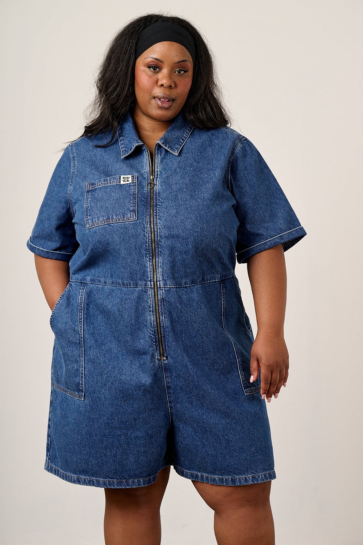 Riley - Short Sleeve Playsuit Organic Cotton Denim in Mid Wash Blue